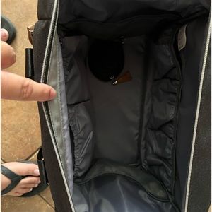 Diaper bag. We use a mini backpack bag.